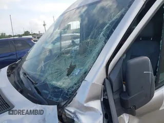 2016 Ford Transit Cargo с VIN 1FTYE1CM0GKB33378, выставлен на аукционе IAAI как лот 42327987 с пробегом 156 020 миль миль и . История ставок и продаж доступна на DreamBid. Изображение 18.