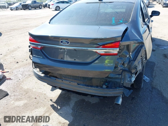 2017 Ford Fusion SE z VIN 3FA6P0H79HR412250, wystawiony jako IAAI lot #41984265 z przebiegiem 108 106 mil mil oraz . Historia ofert i sprzedaży dostępna na DreamBid. Obrazek 6.