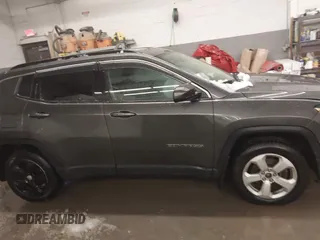 2018 Jeep Compass Altitude with VIN 3C4NJDBB6JT187581, listed as a IAAI auction lot 41542689 with 126,147 mi miles and . Bid and sale history available at carsss.com. Image 13.
