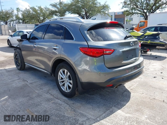 2013 Infiniti FX with VIN JN8CS1MU0DM140711, listed as a IAAI auction lot 40796518 with 179,386 mi miles and . Bid and sale history available at DreamBid. Image 3.