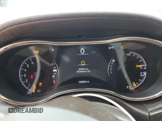 2015 Jeep Grand Cherokee Summit with VIN 1C4RJEJG8FC118673, listed as a Copart auction lot 84052044 with 182,806 mi miles and Salvage title. Bid and sale history available at DreamBid. Image 9.