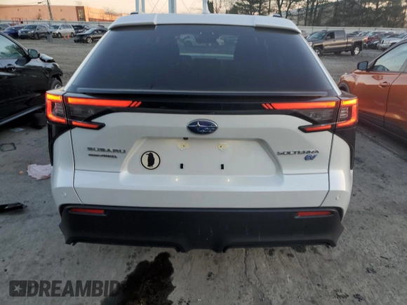2024 Subaru Solterra Premium z VIN JTMABABA4RA063314, wystawiony jako Copart lot #84641414 z przebiegiem 871 mil mil oraz Szkody całkowita. Historia ofert i sprzedaży dostępna na DreamBid. Obrazek 6.