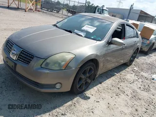 2004 Nissan Maxima SE with VIN 1N4BA41EX4C818420, listed as a IAAI auction lot 42601827 with 179,196 mi miles and . Bid and sale history available at DreamBid. Image 2.