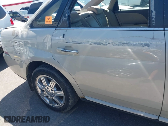 2008 Ford Taurus Limited with VIN 1FAHP28WX8G136552, listed as a IAAI auction lot 42306548 with 148,254 mi miles and . Bid and sale history available at DreamBid. Image 12.