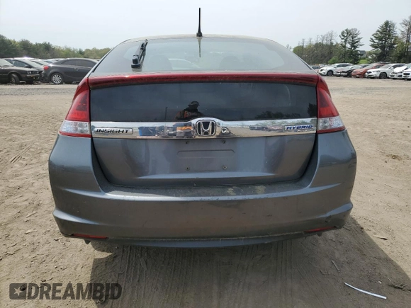 2012 Honda Insight z VIN JHMZE2H34CS006488, wystawiony jako Copart lot #54203575 z przebiegiem Nie podano mil oraz Szkoda całkowita • Salvage title. Historia ofert i sprzedaży dostępna na DreamBid. Obrazek 6.