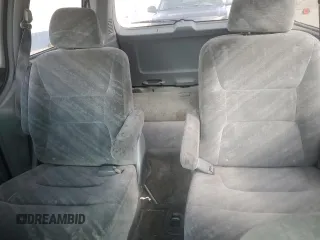 2002 Honda Odyssey EX z VIN 5FNRL18652B014929, wystawiony jako Copart lot #57185775 z przebiegiem 291 807 mil mil oraz Czysty tytuł • Clean title. Historia ofert i sprzedaży dostępna na DreamBid. Obrazek 11.