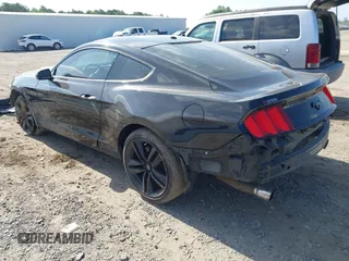 2016 Ford Mustang EcoBoost with VIN 1FA6P8TH7G5301549, listed as a IAAI auction lot 42163306 with 135,576 mi miles and . Bid and sale history available at DreamBid. Image 3.