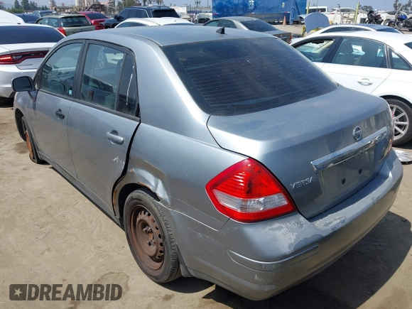 2011 Nissan Versa S with VIN 3N1BC1AP0BL393704, listed as a IAAI auction lot 42334003 with 164,394 mi miles and . Bid and sale history available at DreamBid. Image 3.