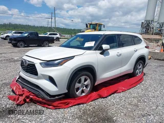 2021 Toyota Highlander L with VIN 5TDCZRAH6MS067507, listed as a IAAI auction lot 38480956 with 23,687 mi miles and . Bid and sale history available at DreamBid. Image 2.