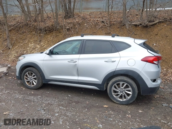 2017 Hyundai Tucson SE with VIN KM8J3CA45HU272171, listed as a IAAI auction lot 41801230 with 100,541 mi miles. Bid and sale history available at carsss.com. Image 15.