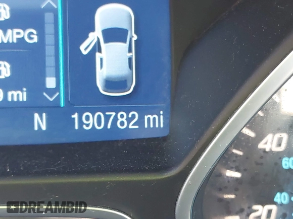 2015 Ford Escape SE with VIN 1FMCU0G97FUB08702, listed as a IAAI auction lot 42045471 with 190,782 mi miles and . Bid and sale history available at DreamBid. Image 7.