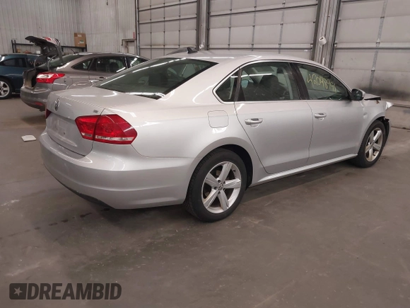 2013 Volkswagen Passat SE with VIN 1VWBH7A39DC145297, listed as a IAAI auction lot 42048991 with 146,897 mi miles and . Bid and sale history available at DreamBid. Image 4.