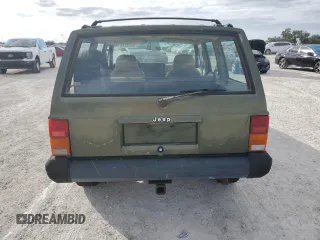 1996 Jeep Cherokee SE z VIN 1J4FJ28S9TL211073, wystawiony jako Copart lot #78052574 z przebiegiem 174 967 mil mil oraz Nie do naprawy • Non repairable. Historia ofert i sprzedaży dostępna na DreamBid. Obrazek 6.