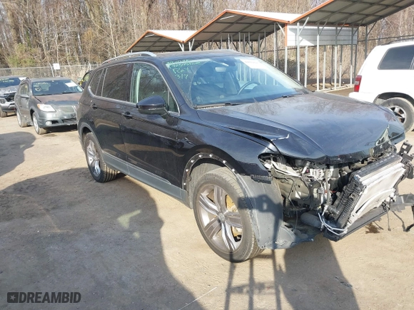 2020 Volkswagen Tiguan SE with VIN 3VV2B7AXXLM076870, listed as a IAAI auction lot 41811623 with 37,064 mi miles. Bid and sale history available at carsss.com. Image 1.