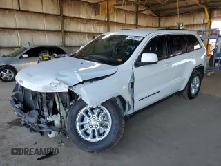 2020 Jeep Grand Cherokee Laredo with VIN 1C4RJFAG8LC322259, listed as a Copart auction lot 64227035 with 105,811 mi miles and Salvage title. Bid and sale history available at DreamBid. Image 1.