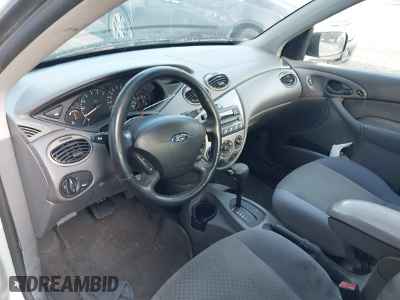 2004 Ford Focus ZTS with VIN 1FAFP38Z74W154059, listed as a IAAI auction lot 41695294 with 146,270 mi miles and . Bid and sale history available at carsss.com. Image 5.