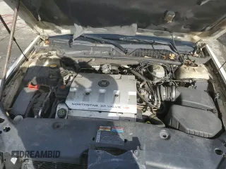 2001 Cadillac DeVille z VIN 1G6KD54YX1U252491, wystawiony jako Copart lot #50325445 z przebiegiem Nie podano mil oraz Szkoda całkowita • Salvage title. Historia ofert i sprzedaży dostępna na DreamBid. Obrazek 11.