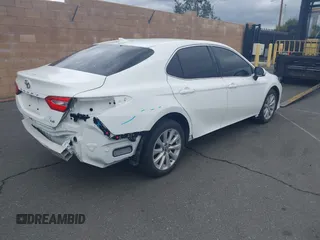 2020 Toyota Camry LE with VIN 4T1C11AK3LU882824, listed as a IAAI auction lot 41765544 with 48,209 mi miles and . Bid and sale history available at carsss.com. Image 4.