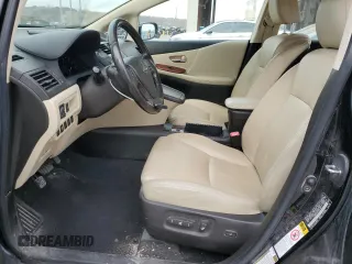 2010 Lexus HS 250h with VIN JTHBB1BA9A2016801, listed as a Copart auction lot 82560674 with 236,915 mi miles and Salvage Title. Bid and sale history available at DreamBid. Image 7.