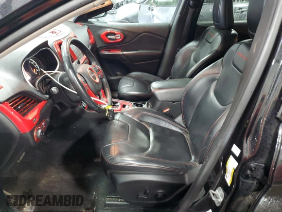 2014 Jeep Cherokee Trailhawk with VIN 1C4PJMBSXEW187981, listed as a Copart auction lot 56711885 with 157,317 mi miles and Salvage title. Bid and sale history available at DreamBid. Image 7.