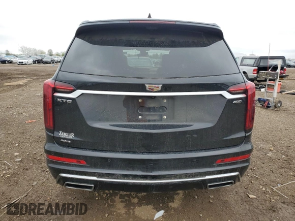 2022 Cadillac XT6 Premium Luxury z VIN 1GYKPFRS9NZ103281, wystawiony jako Copart lot #55118485 z przebiegiem 52 413 mil mil oraz Szkoda całkowita • Salvage title. Historia ofert i sprzedaży dostępna na DreamBid. Obrazek 6.