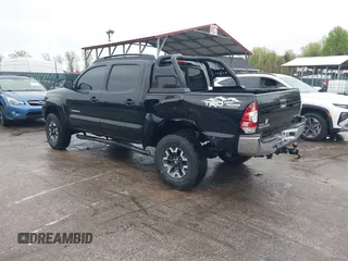2015 Toyota Tacoma with VIN 3TMLU4ENXFM185371, listed as a IAAI auction lot 41952513 with 87,128 mi miles and . Bid and sale history available at DreamBid. Image 3.