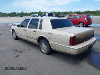 1996 Lincoln Town Car Cartier with VIN 1LNLM83W7TY634343, listed as a IAAI auction lot 42474123 with 193,705 mi miles and . Bid and sale history available at DreamBid. Image 3.