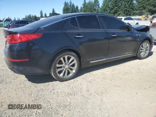 2015 Kia Optima SX Turbo with VIN 5XXGR4A63FG517153, listed as a Copart auction lot 65068985 with 153,482 mi miles and Salvage title. Bid and sale history available at DreamBid. Image 3.