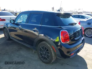 2019 MINI Hardtop 4 Door Cooper S with VIN WMWXU3C58K2H88917, listed as a IAAI auction lot 41750484 with 49,455 mi miles and . Bid and sale history available at DreamBid. Image 3.