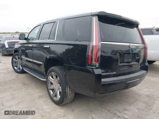 2018 Cadillac Escalade Luxury with VIN 1GYS4BKJ3JR143952, listed as a IAAI auction lot 41333902 with 124,265 mi miles. Bid and sale history available at carsss.com. Image 3.