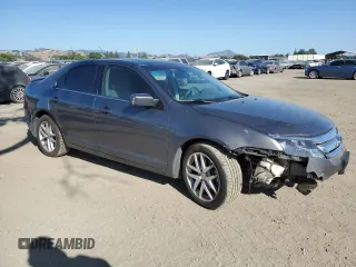 2012 Ford Fusion SEL z VIN 3FAHP0JA0CR398150, wystawiony jako Copart lot #57864455 z przebiegiem 166 046 mil mil oraz Szkoda całkowita • Salvage title. Historia ofert i sprzedaży dostępna na DreamBid. Obrazek 4.