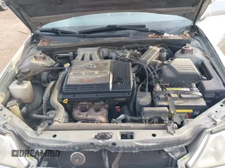 2002 Toyota Avalon XL with VIN 4T1BF28B82U205176, listed as a IAAI auction lot 41569373 with Not Provided miles and . Bid and sale history available at DreamBid. Image 10.