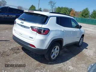 2023 Jeep Compass Latitude with VIN 3C4NJDBN9PT561829, listed as a IAAI auction lot 41994610 with 29,583 mi miles and . Bid and sale history available at DreamBid. Image 4.