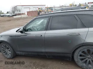2018 Land Rover Range Rover Velar S z VIN SALYB2RV6JA750501, wystawiony jako IAAI lot #40882723 z przebiegiem 77 338 mil mil oraz . Historia ofert i sprzedaży dostępna na DreamBid. Obrazek 14.