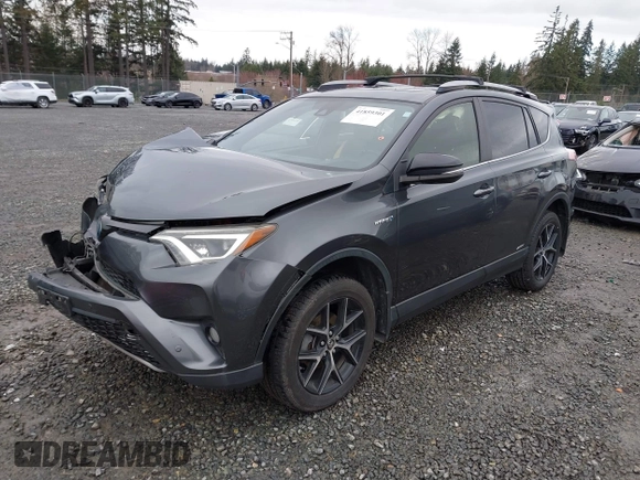2018 Toyota RAV4 Hybrid SE with VIN JTMJJREV7JD208249, listed as a IAAI auction lot 41859301 with 91,899 mi miles and . Bid and sale history available at DreamBid. Image 2.
