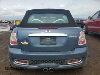 2011 MINI Convertible S z VIN WMWZP3C52BTX84305, wystawiony jako Copart lot #59586995 z przebiegiem 36 217 mil mil oraz Szkoda całkowita • Salvage title. Historia ofert i sprzedaży dostępna na DreamBid. Obrazek 6.