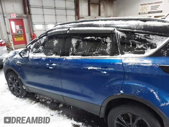 2017 Ford Escape SE with VIN 1FMCU9GD0HUD61453, listed as a IAAI auction lot 41596562 with 173,803 mi miles and . Bid and sale history available at DreamBid. Image 14.