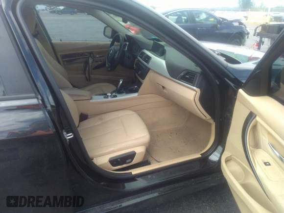 2013 BMW 3 Series 328i with VIN WBA3A5G55DNP26709, listed as a IAAI auction lot 37057796 with 103,168 mi miles and . Bid and sale history available at DreamBid. Image 5.