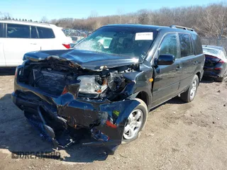 2008 Honda Pilot EX-L with VIN 5FNYF18518B042861, listed as a IAAI auction lot 41733408 with 169,349 mi miles. Bid and sale history available at carsss.com. Image 2.