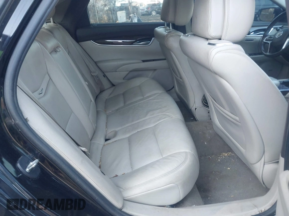 2013 Cadillac XTS Premium z VIN 2G61S5S38D9199459, wystawiony jako IAAI lot #41787638 z przebiegiem 171 298 mil mil oraz . Historia ofert i sprzedaży dostępna na DreamBid. Obrazek 8.