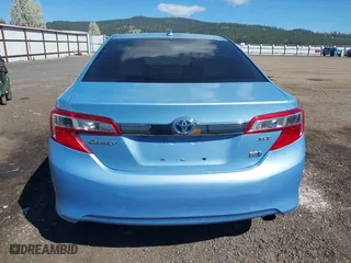 2014 Toyota Camry Hybrid LE with VIN 4T1BD1FK7EU098824, listed as a IAAI auction lot 42063119 with 112,759 mi miles. Bid and sale history available at carsss.com. Image 16.