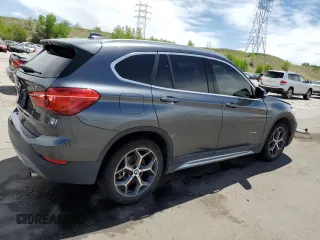 2016 BMW X1 xDrive28i z VIN WBXHT3C34GP883767, wystawiony jako Copart lot #56708375 z przebiegiem 96 285 mil mil oraz Szkoda całkowita • Salvage title. Historia ofert i sprzedaży dostępna na DreamBid. Obrazek 3.
