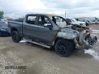 2021 Chevrolet Silverado 1500 LT with VIN 3GCUYDEDXMG215061, listed as a IAAI auction lot 42389015 with Not provided miles and . Bid and sale history available at DreamBid. Image 1.