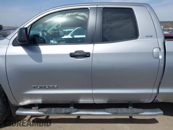 2018 Toyota Tundra 2WD SR with VIN 5TFRM5F16JX133735, listed as a IAAI auction lot 41818455 with 148,456 mi miles. Bid and sale history available at carsss.com. Image 14.