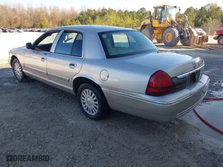 2007 Mercury Grand Marquis LS with VIN 2MEFM75V87X628541, listed as a IAAI auction lot 41051994 with 183,363 mi miles. Bid and sale history available at carsss.com. Image 3.