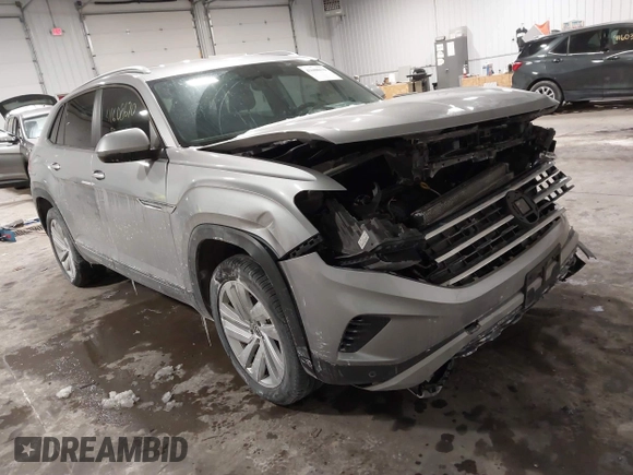 2021 Volkswagen Atlas SE z VIN 1V2HE2CA9MC219076, wystawiony jako IAAI lot #41608670 z przebiegiem 56 162 mil mil oraz . Historia ofert i sprzedaży dostępna na DreamBid. Obrazek 1.