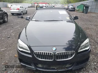 2017 BMW 6 Series 650i xDrive z VIN WBA6F7C52HD930816, wystawiony jako IAAI lot #42168478 z przebiegiem 89 191 mil mil oraz . Historia ofert i sprzedaży dostępna na DreamBid. Obrazek 12.