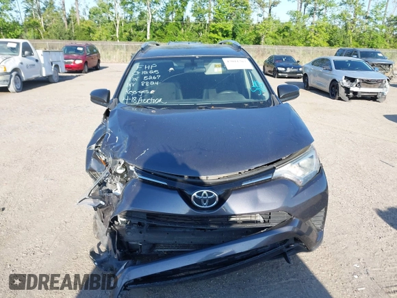 2016 Toyota RAV4 LE with VIN JTMZFREV7GJ065267, listed as a IAAI auction lot 42011267 with 180,127 mi miles. Bid and sale history available at carsss.com. Image 12.
