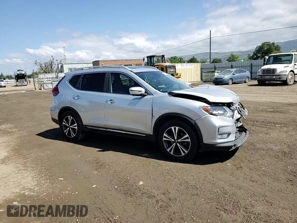 2017 Nissan Rogue SL z VIN 5N1AT2MT3HC885683, wystawiony jako Copart lot #54957275 z przebiegiem 127 879 mil mil oraz Szkoda całkowita • Salvage title. Historia ofert i sprzedaży dostępna na DreamBid. Obrazek 14.