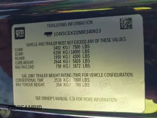 2021 Chevrolet Suburban RST z VIN 1GNSCEKD2MR340613, wystawiony jako IAAI lot #41853016 z przebiegiem 77 498 mil mil oraz . Historia ofert i sprzedaży dostępna na DreamBid. Obrazek 9.